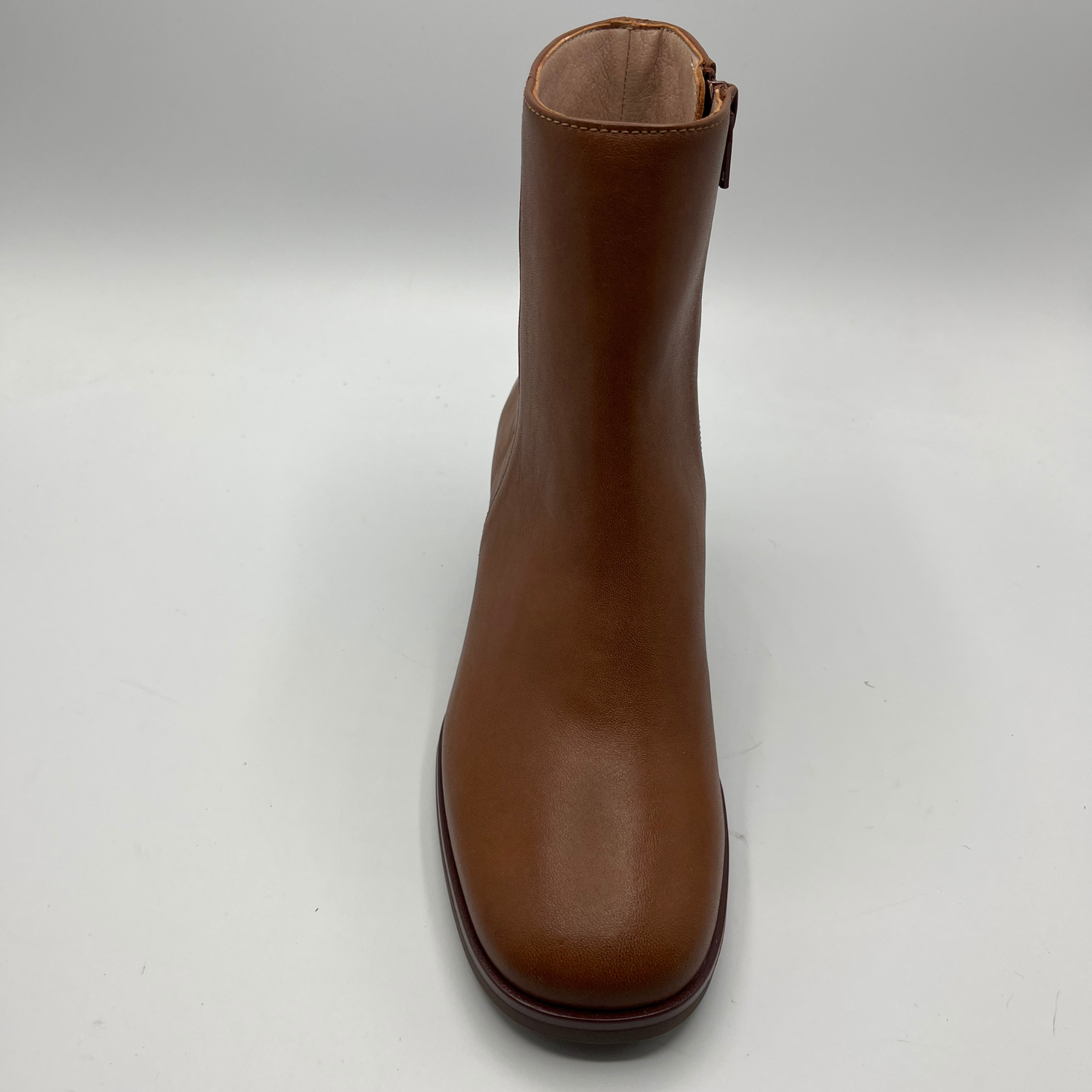 Brown ankle boot on a white background