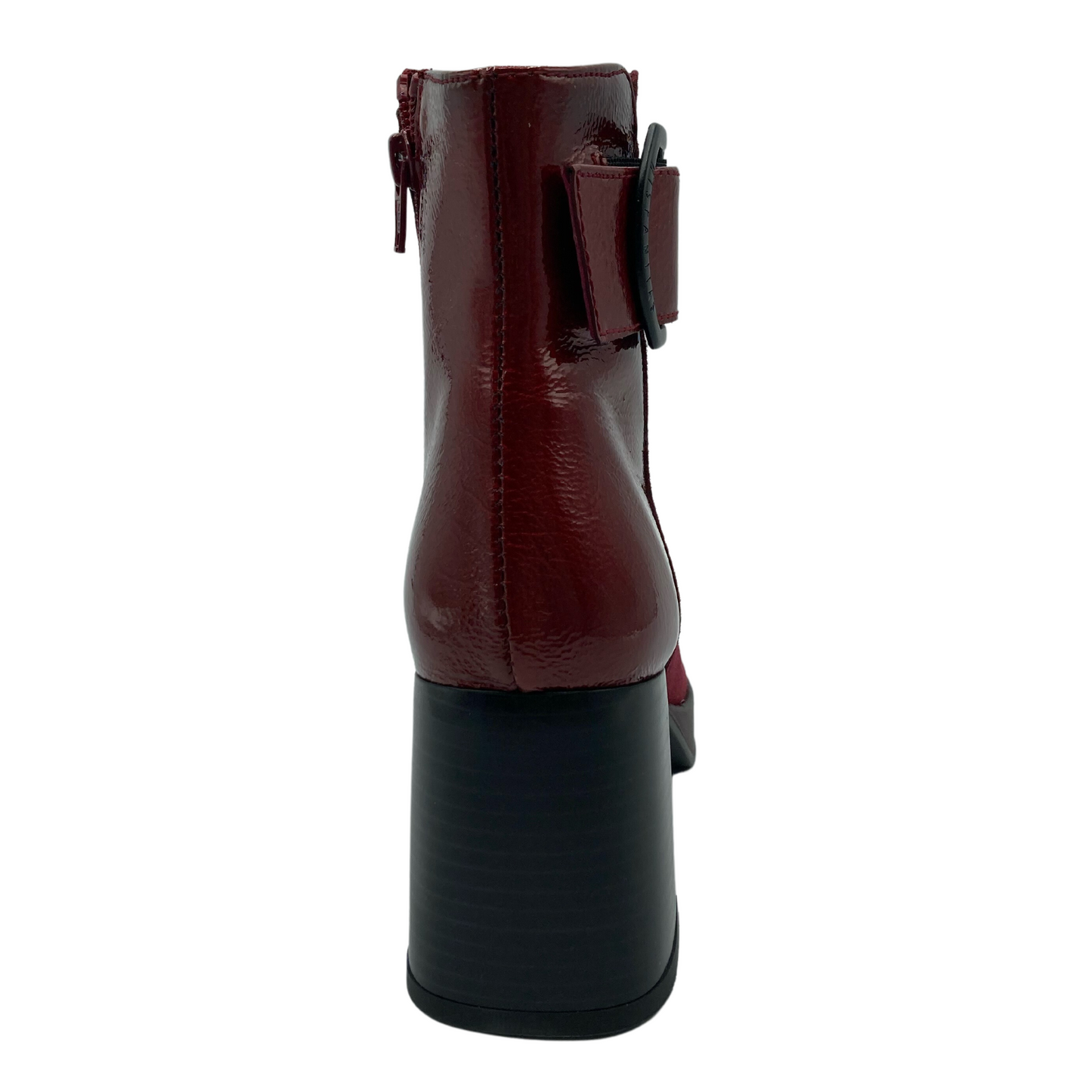 Heel view of chunky high heeled red leather boot