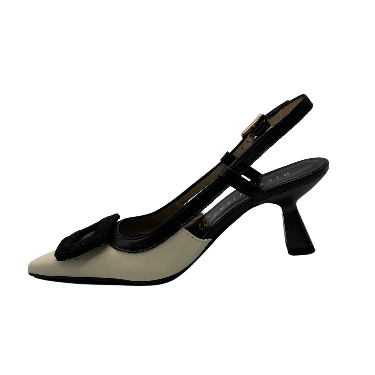 Left facing view of black and ivory leather pump with flared heel and slingback strap.