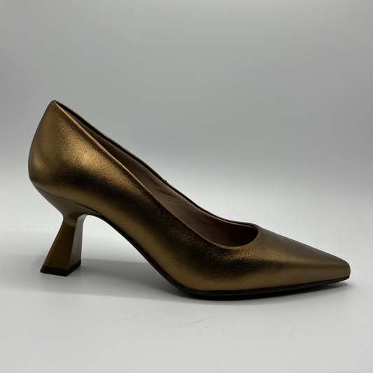 Bronze high-heeled shoe on a gray background