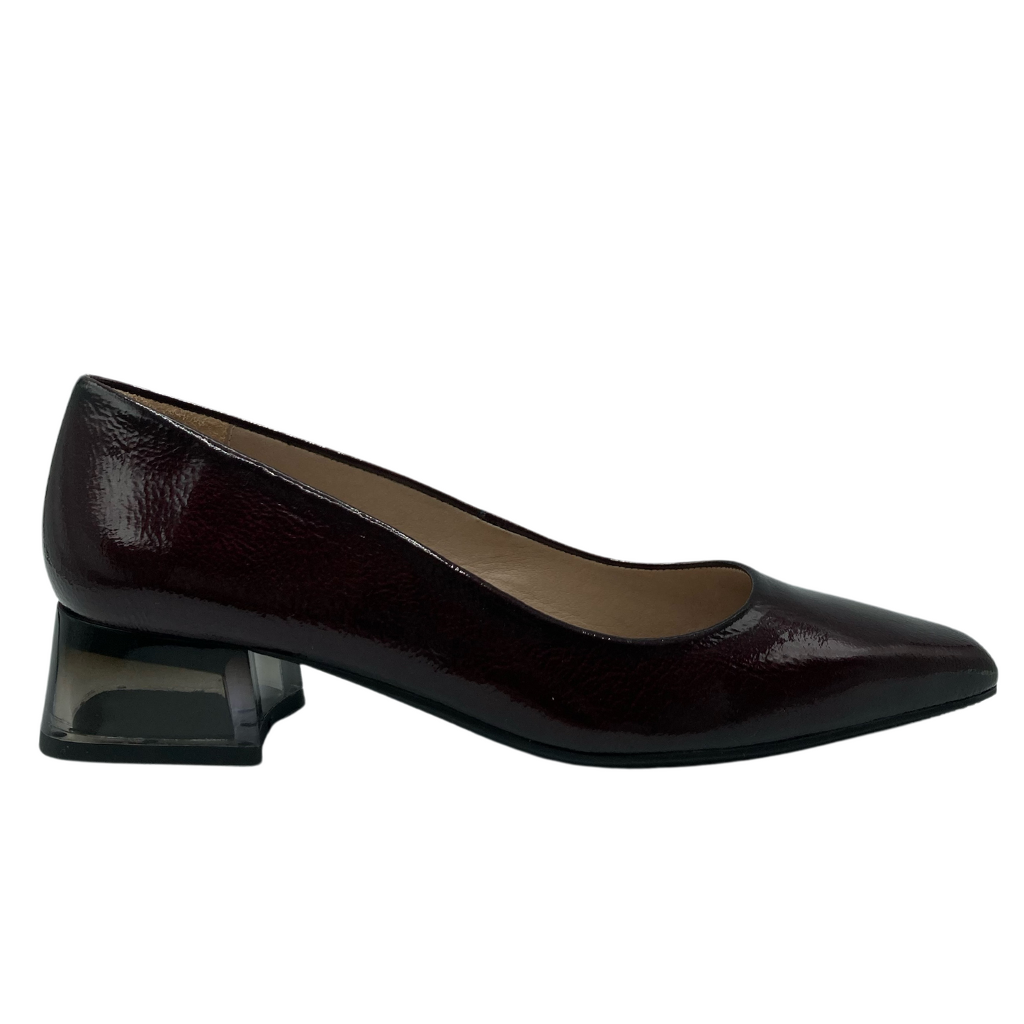 Right facing view of wine patent leather pump with short block heel and beige lining