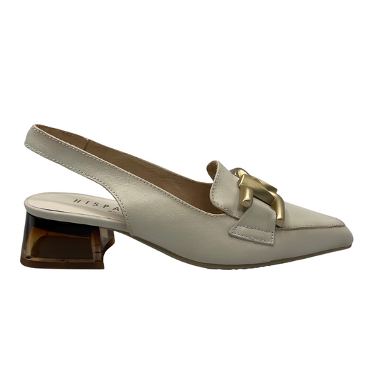 Right facing view of leather pump with pointed toe and translucent heel