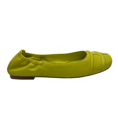 Right facing view of lime leather ballet flats with a rounded toe and elasticated back