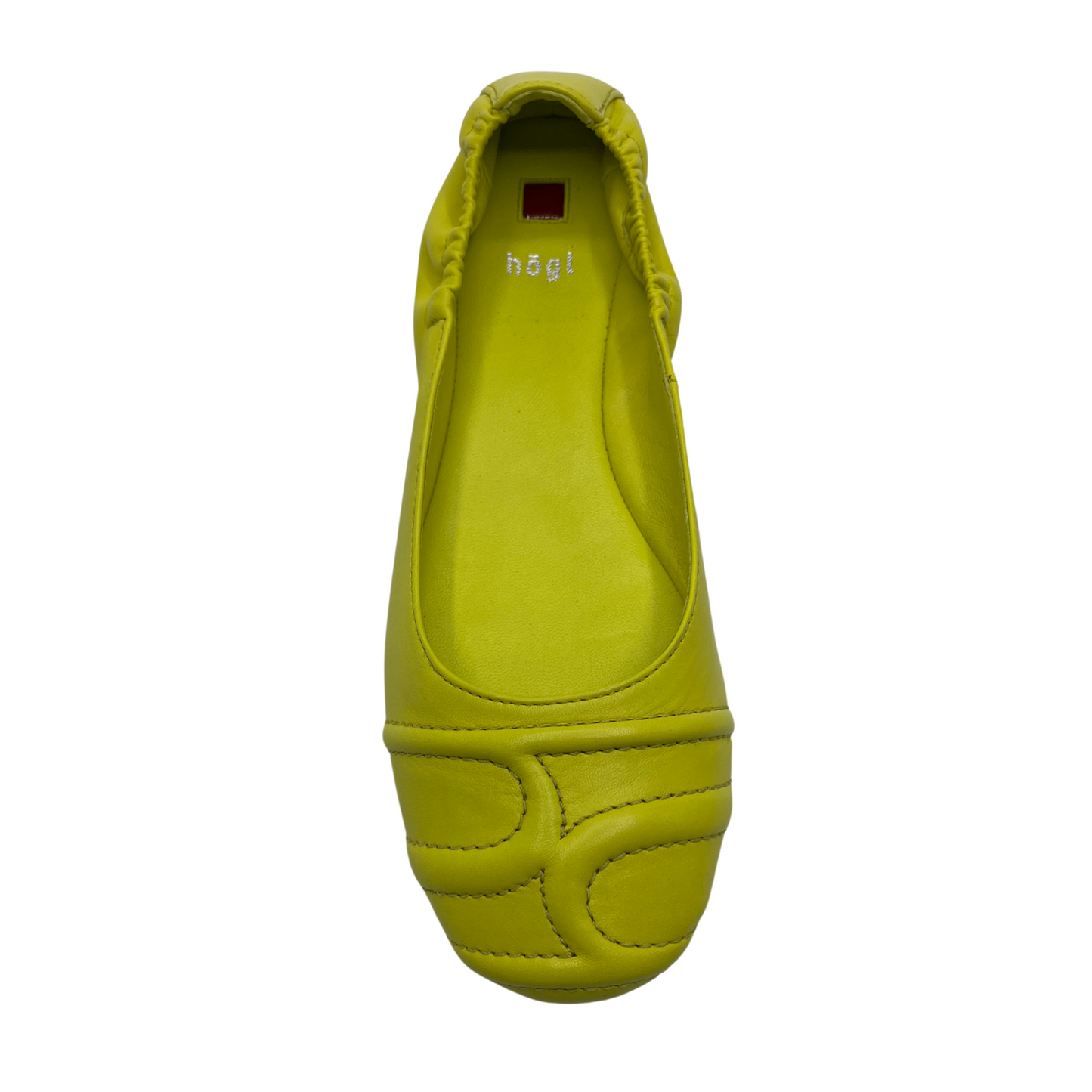 Top view of lime leather ballet flats with a rounded toe and elasticated back