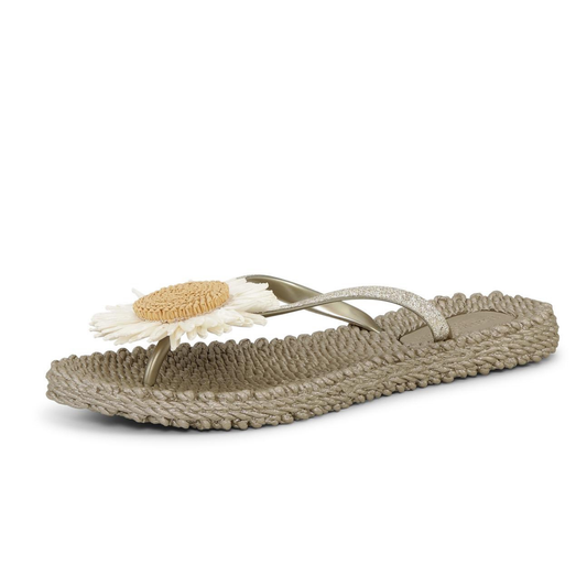 Beige sandal with floral design on a white background