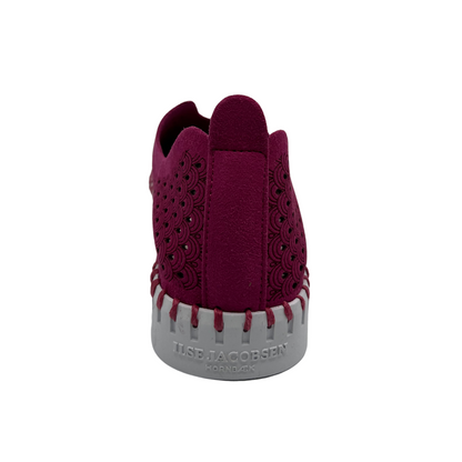Back view of maroon embossed cutout slip on sneakers with white rubber outsole