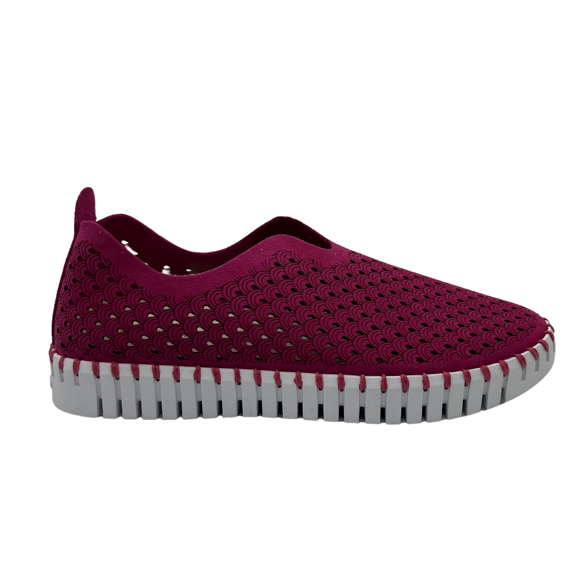 Right facing view of maroon embossed cutout slip on sneakers with white rubber outsole