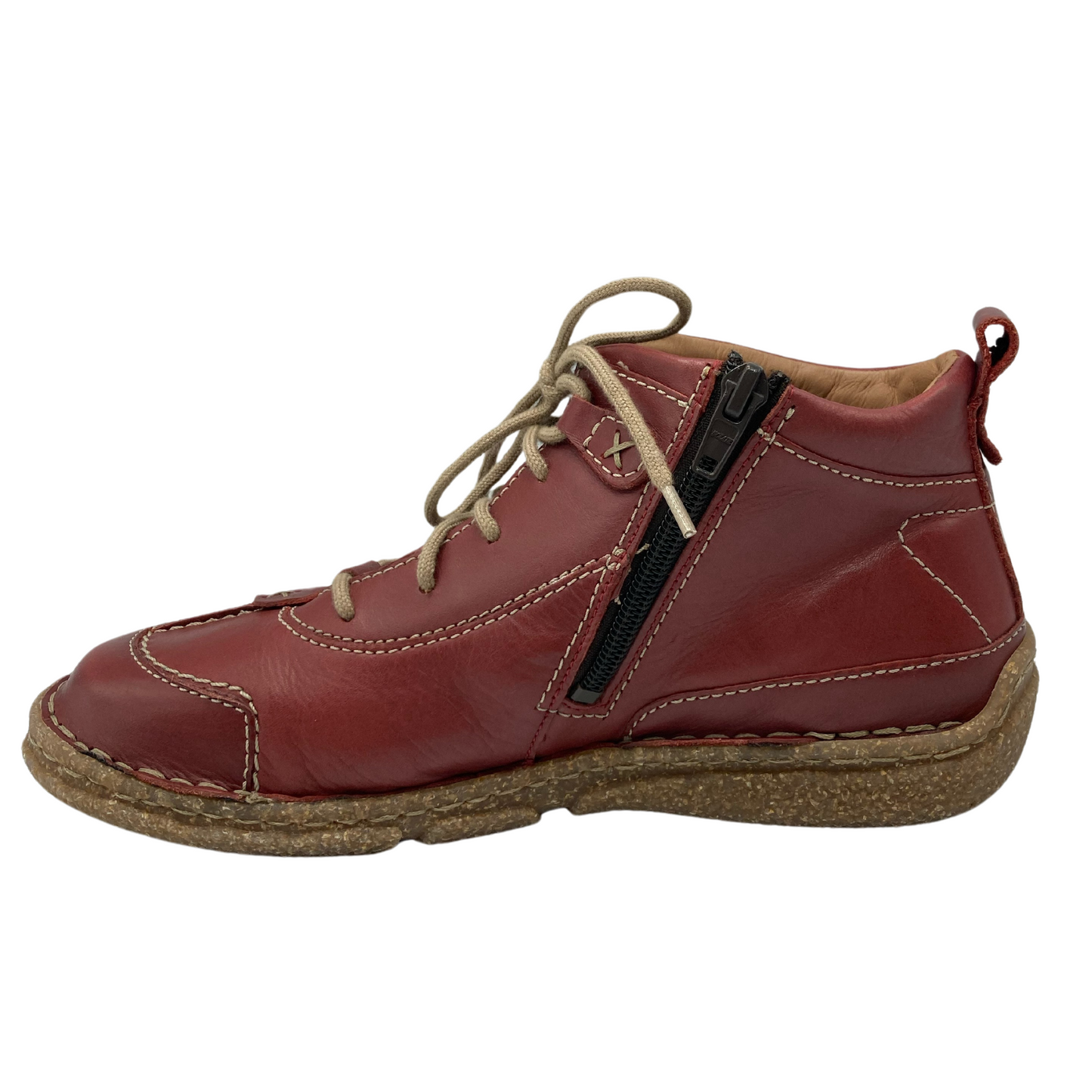 Left facing view of red leather shoe with black side zipper and tan laces