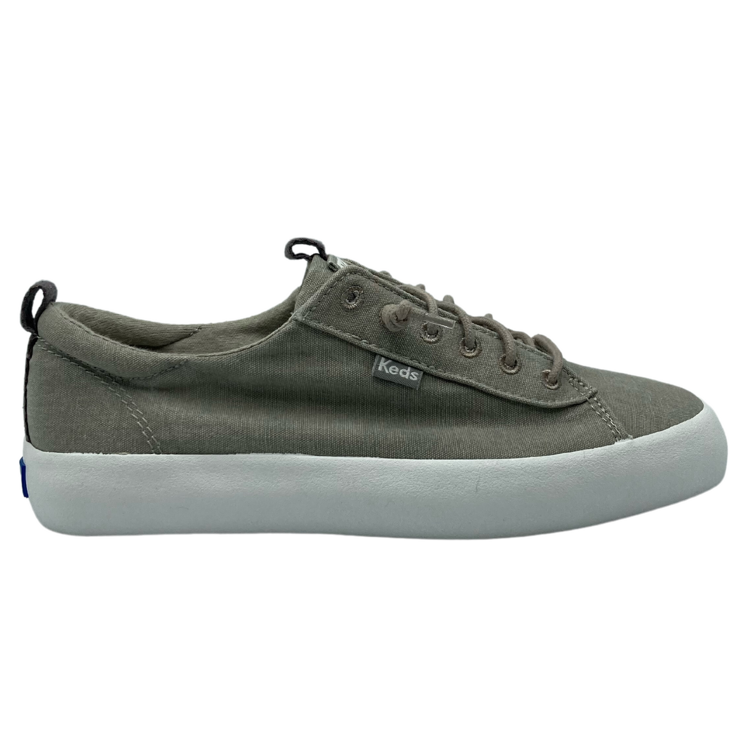 Outer View of sneaker in grey with white rubber soles