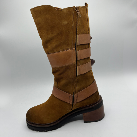 Brown suede boot with multiple straps on a white background
