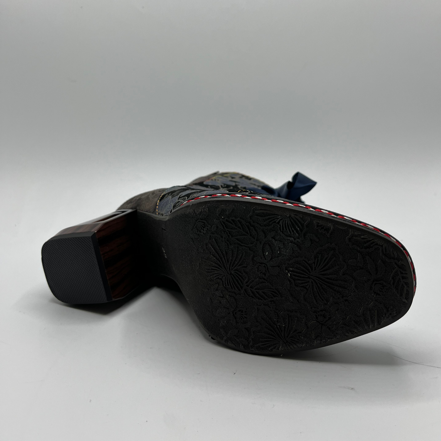 Black leather shoe sole on a white background