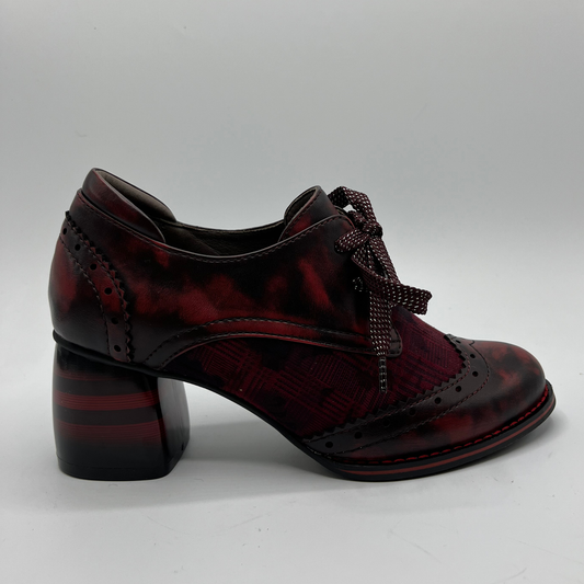 Red mix shoe with a block heel on a white background