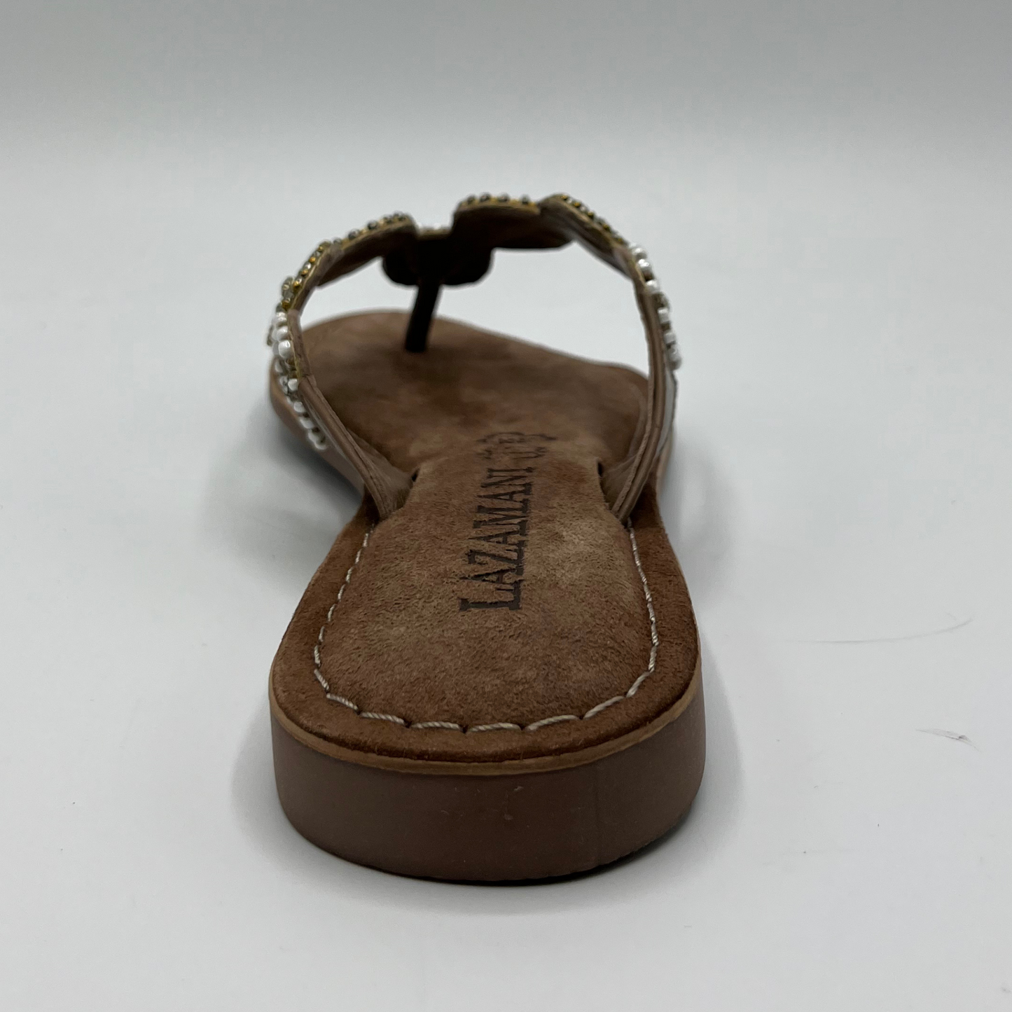Back view of a beaded strapped, thong sandal with a suede wrapped footbed and lightweight rubber outsole.
