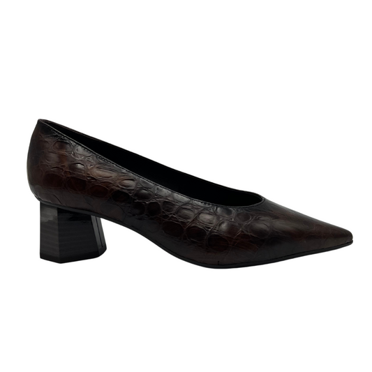 Right facing view of brown embossed leather pump with hexagonal shaped heel and pointed toe.