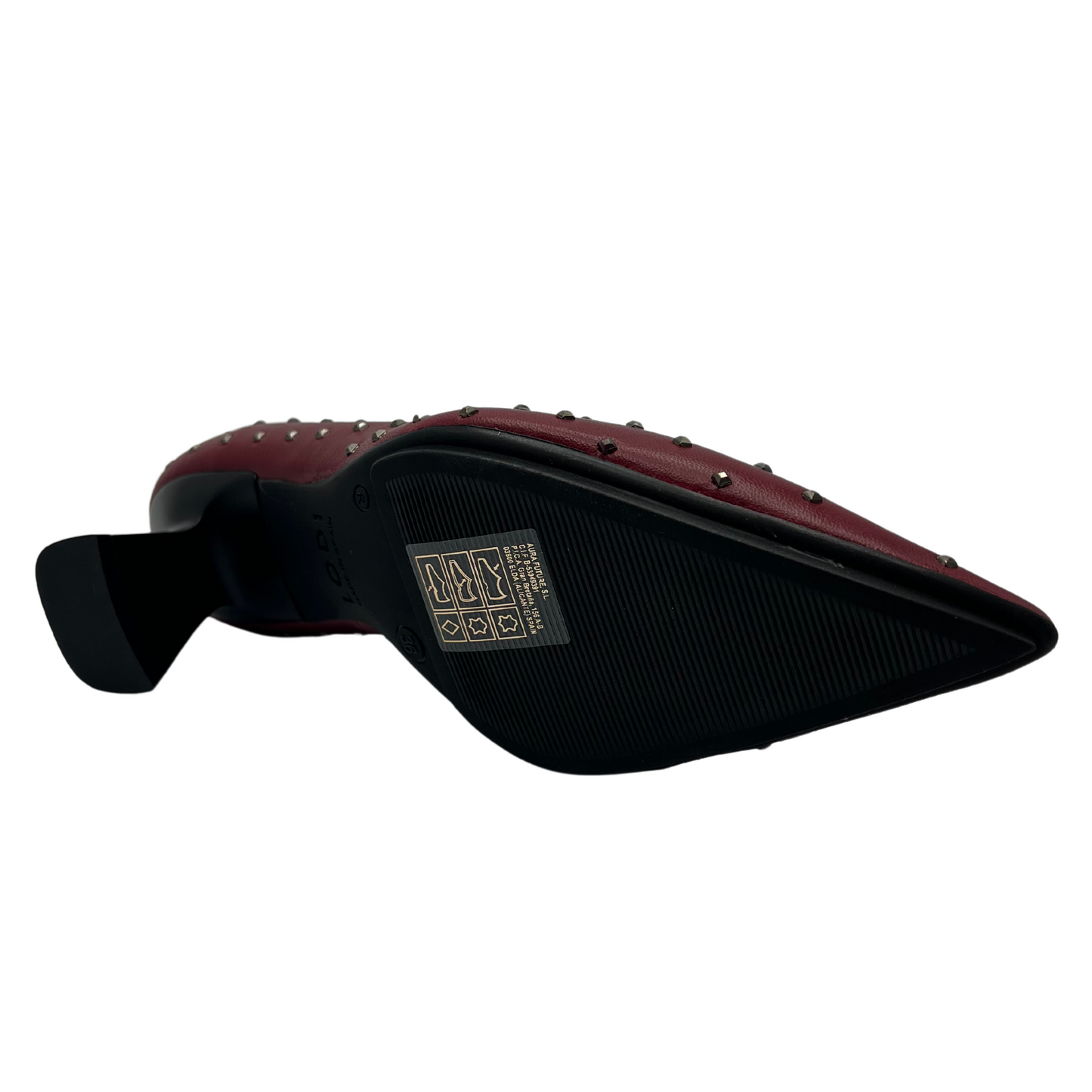 Bottom view of red leather pump with metallic studs and flared heel