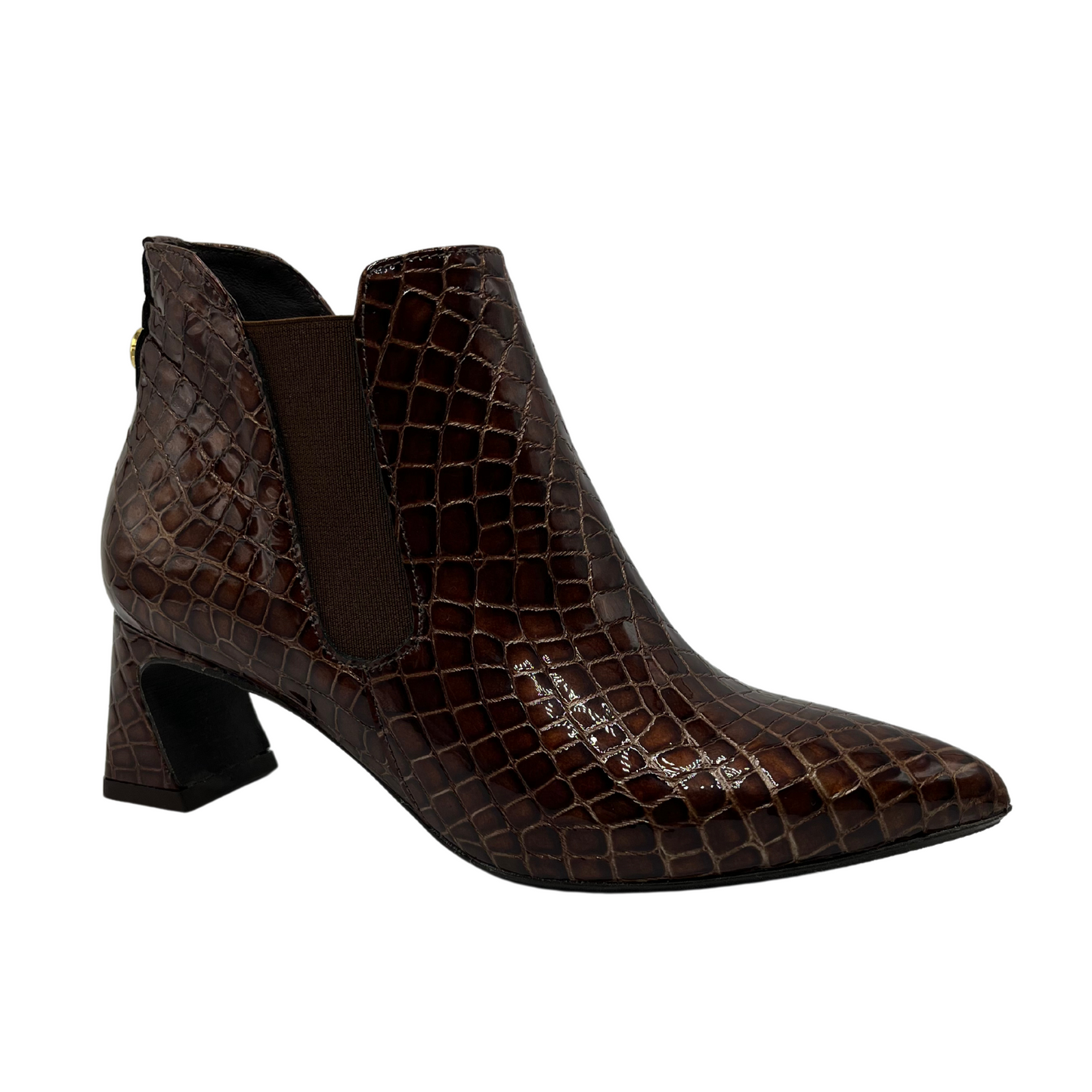 45 degree angled view of textured croc print leather bootie with a pointed toe and flared heel