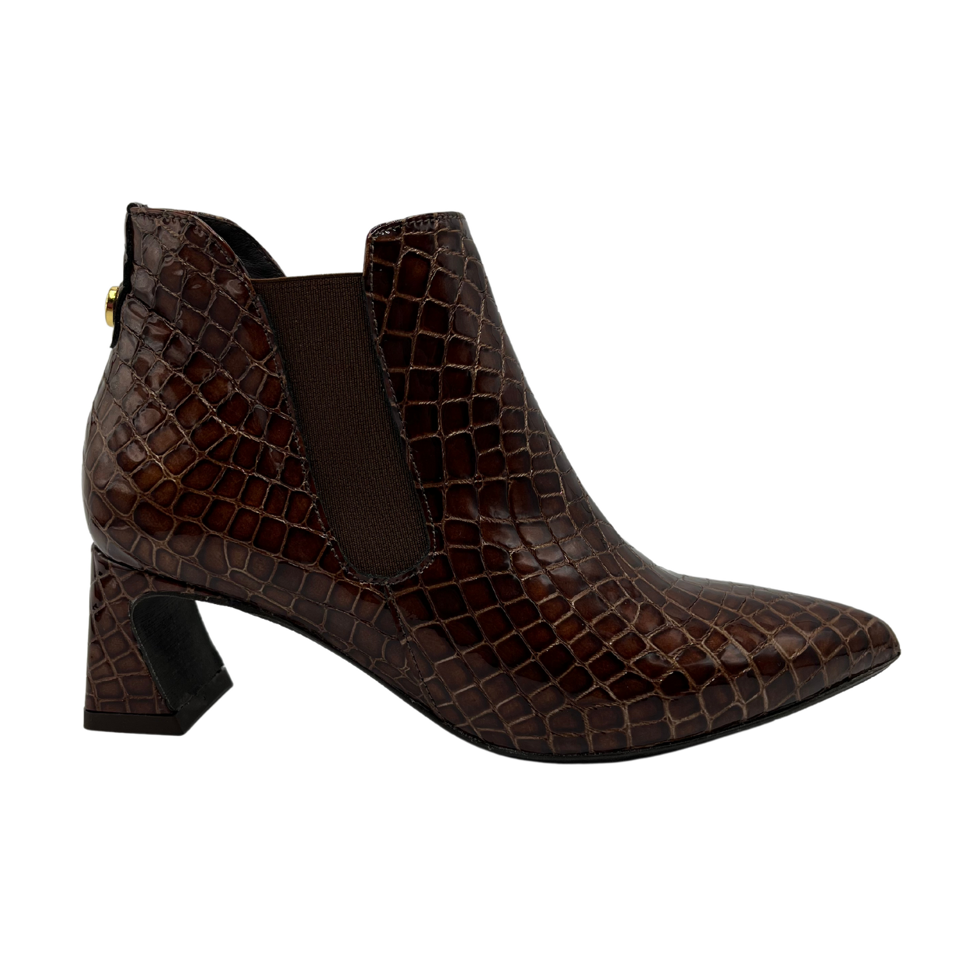 Right facing view of textured croc print leather bootie with a pointed toe and flared heel