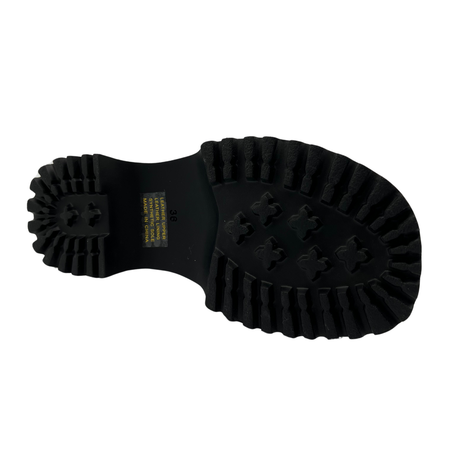 Bottom view of orange leather sandal with thick black sole, cross over straps and open toe