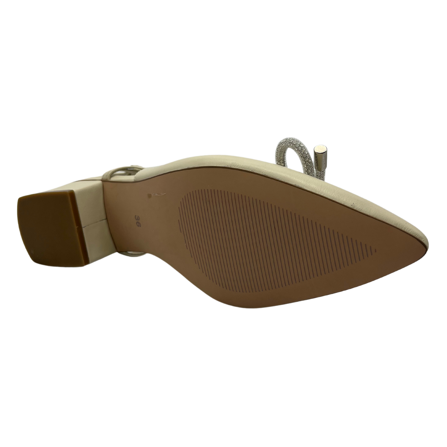 Bottom view of an ivory leather slingback pump with a rhinestone bow detail on upper and pointed toe.