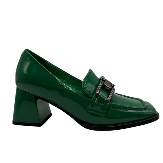 Right facing view of green patent leather loafer with flared bock heel, square toe and black bit detail on upper.