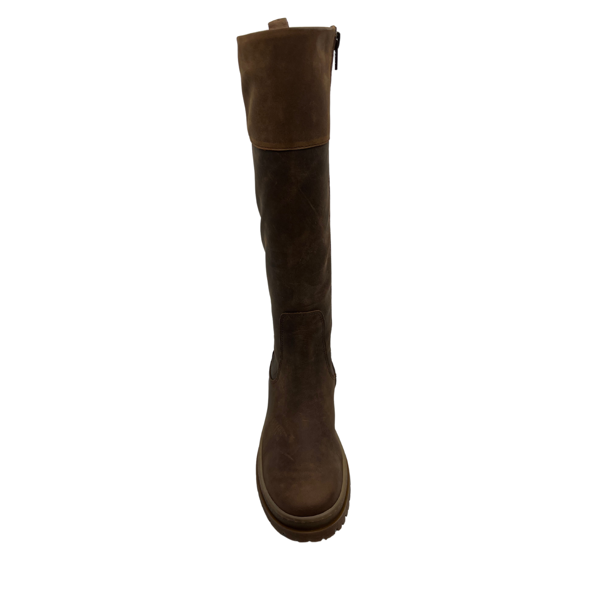 Top view of brown leather knee height boot with rubber lug outsole, inside zipper and pull on tab
