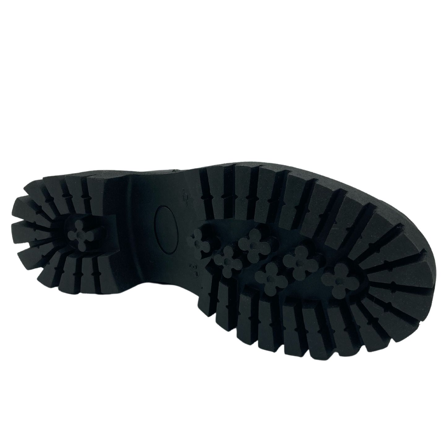 Bottom view of leather boot with chunky black rubber outsole
