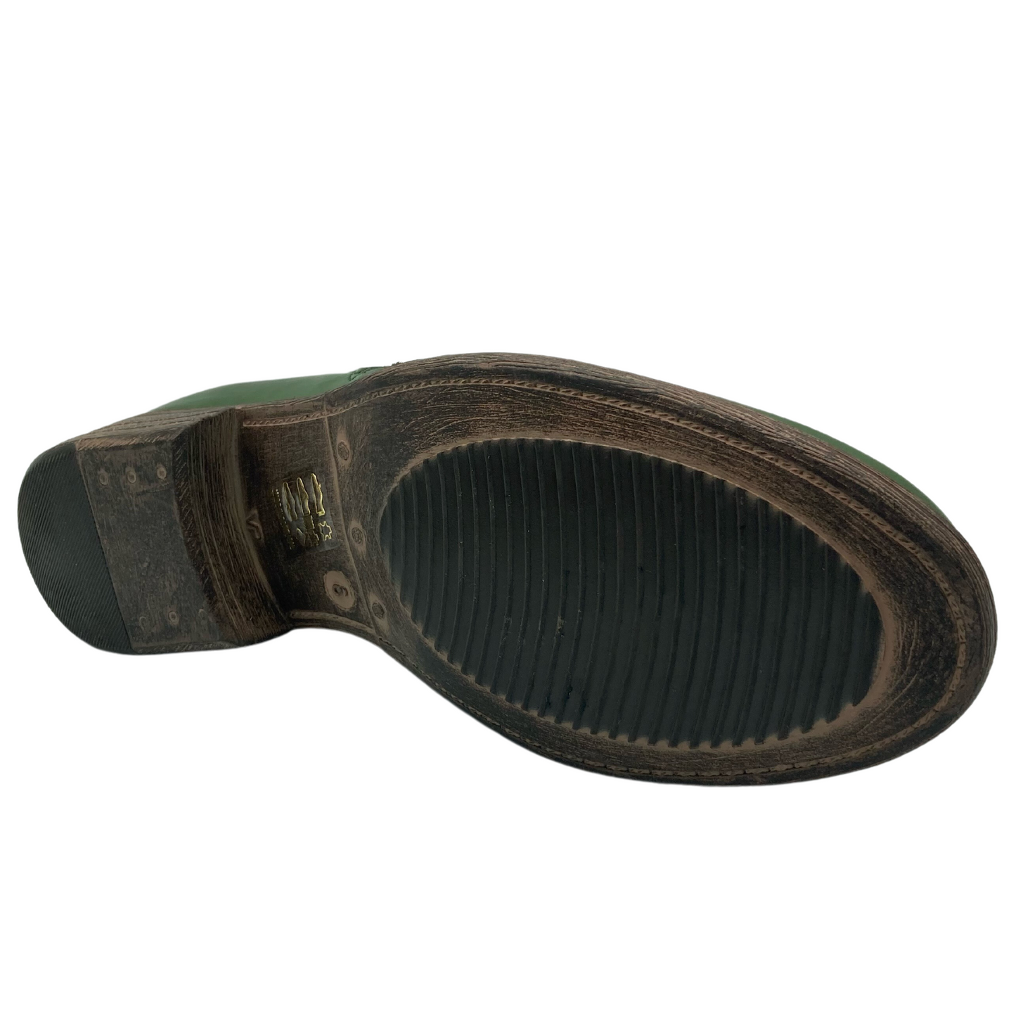 Bottom view of green leather ankle boot with block heel and brown and black sole