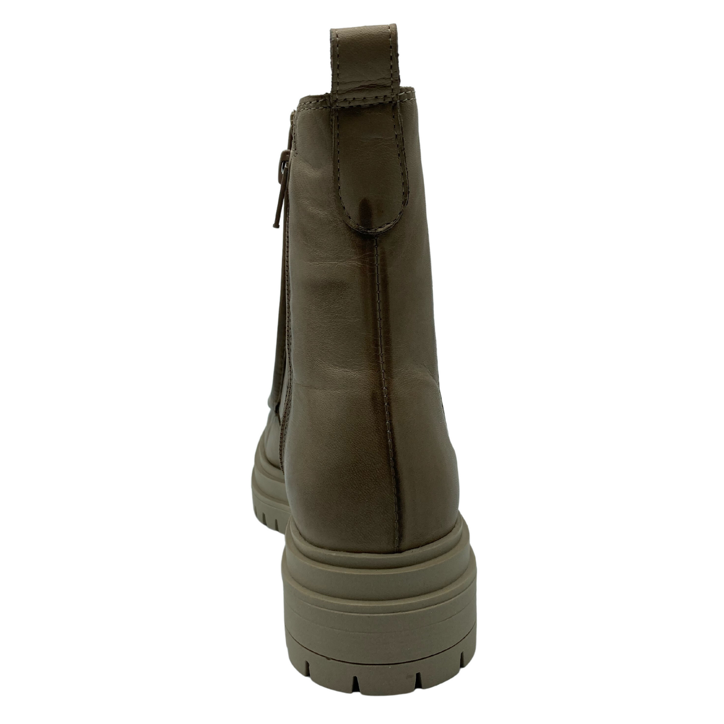 Back view of leather short boot with beige rubber outsole and pull on tab
