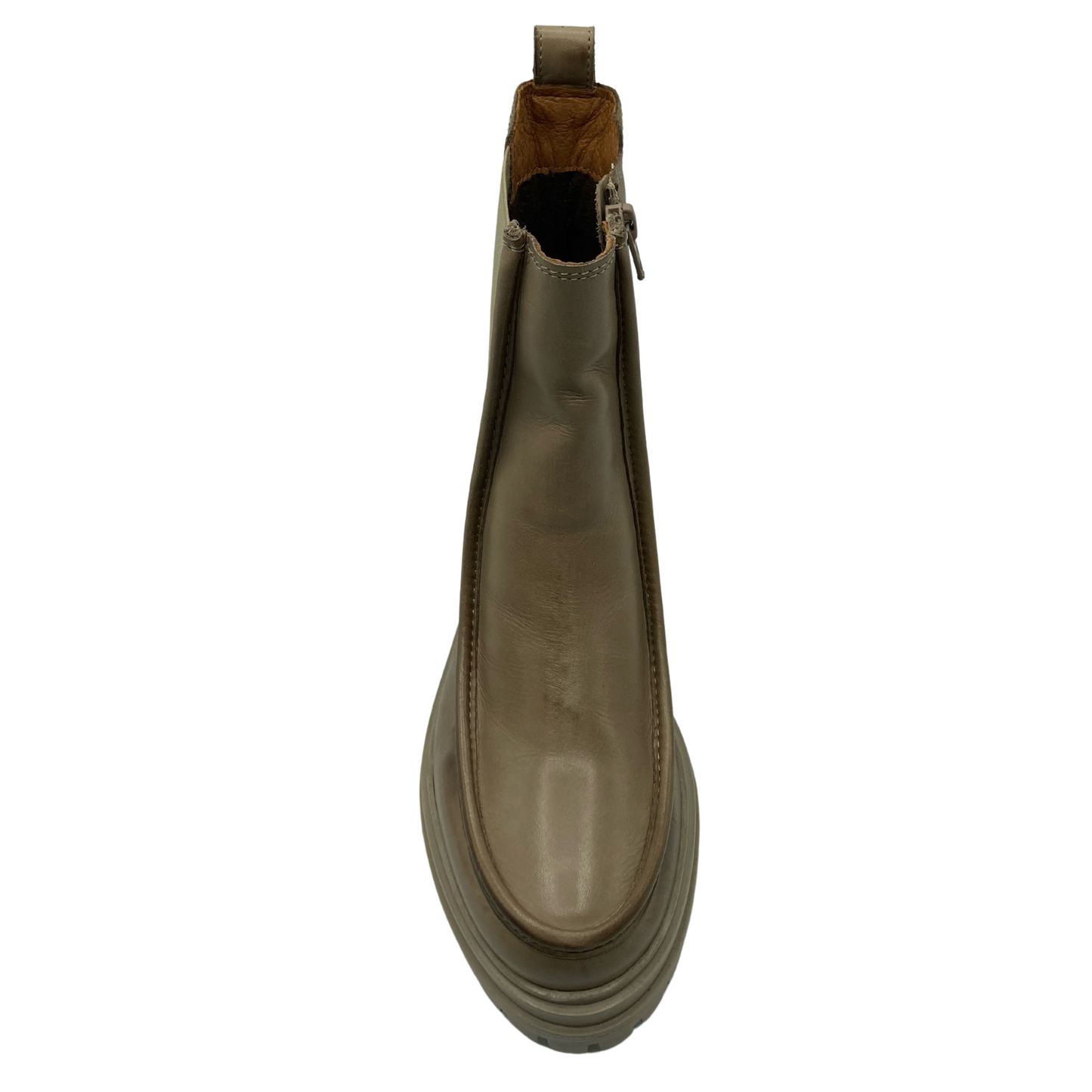 Top view of rounded toe short boot with rubber outsole and pull on tab