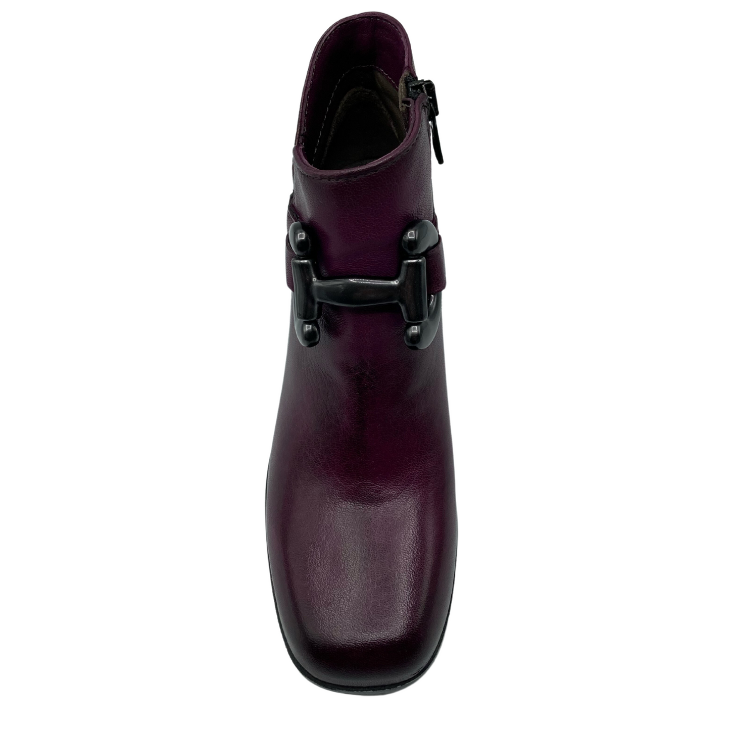 Top down view of purple leather boot with square toe and grey bit detail on the front