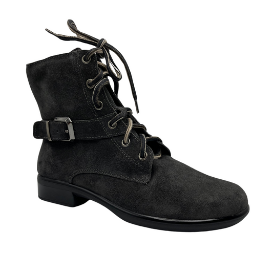 45 degree angled view of grey suede short boots with faux side buckle, lace up front and sturdy block heel