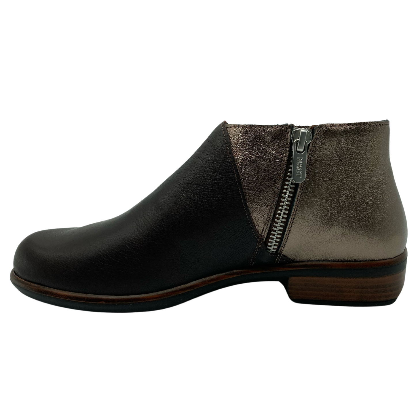 Left facing view of brown and copper leather short ankle bootie with silver zipper closure and block heel