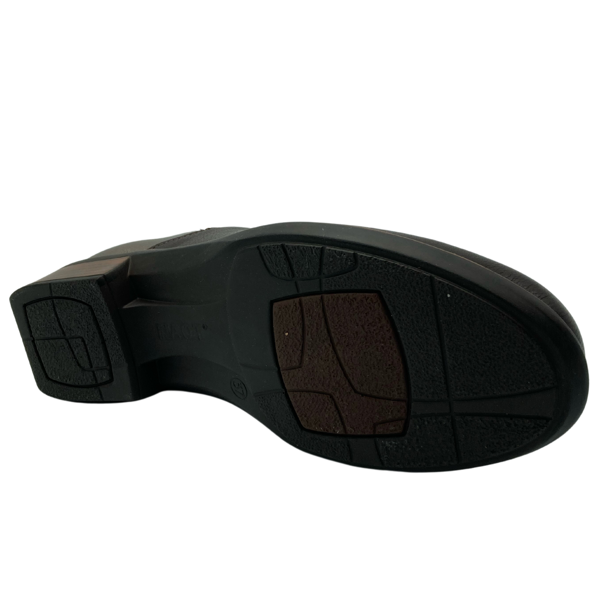Bottom view of rubber sole and block heel of brown leather bootie