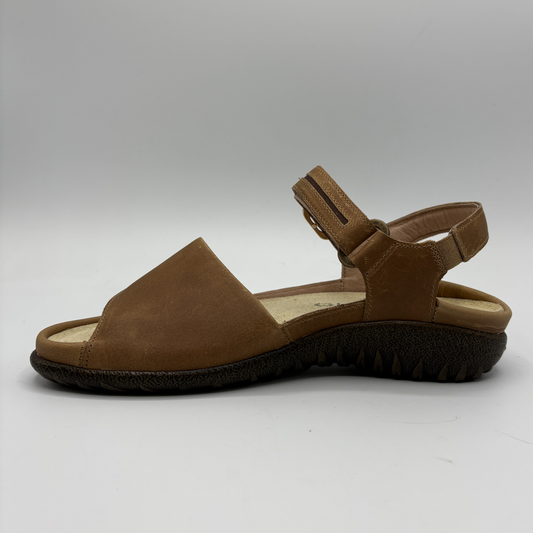 Left facing view of a brown adjustable strap sandal