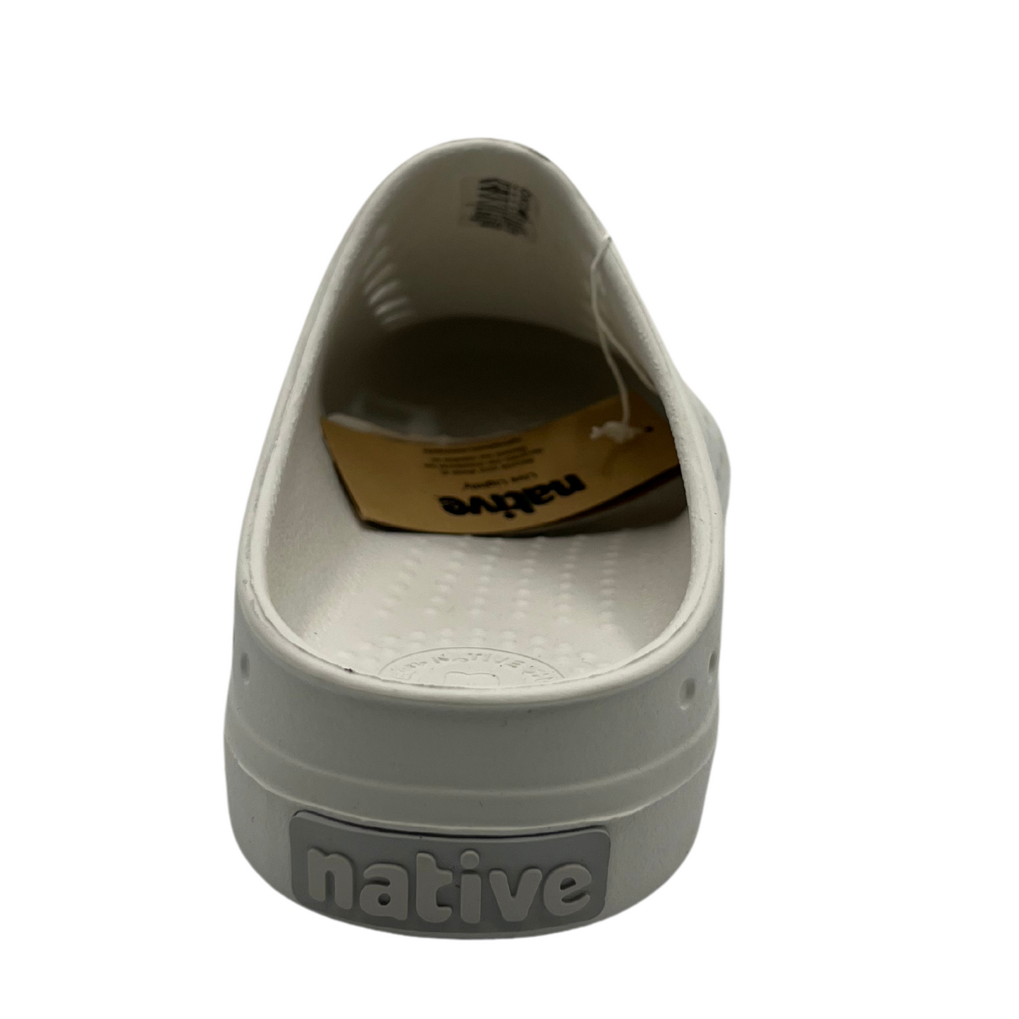 Back view of white slip on summer shoe. Perforated upper and rounded toe