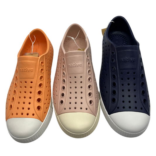 Top view of 3 shoes in a line. One is papaya orange, the middle is pink and the last is navy. All have a rounded toe and perforated upper