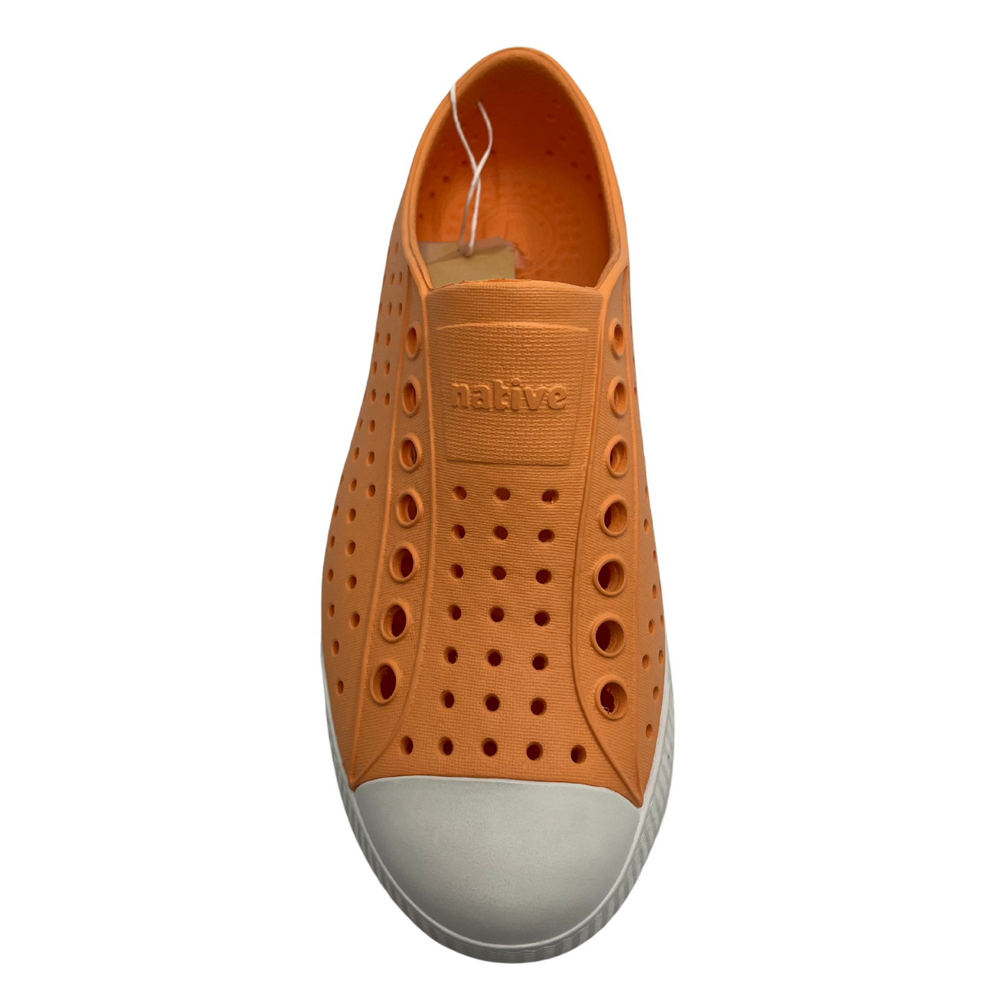 Top view of orange shoe with perforated upper and rounded toe