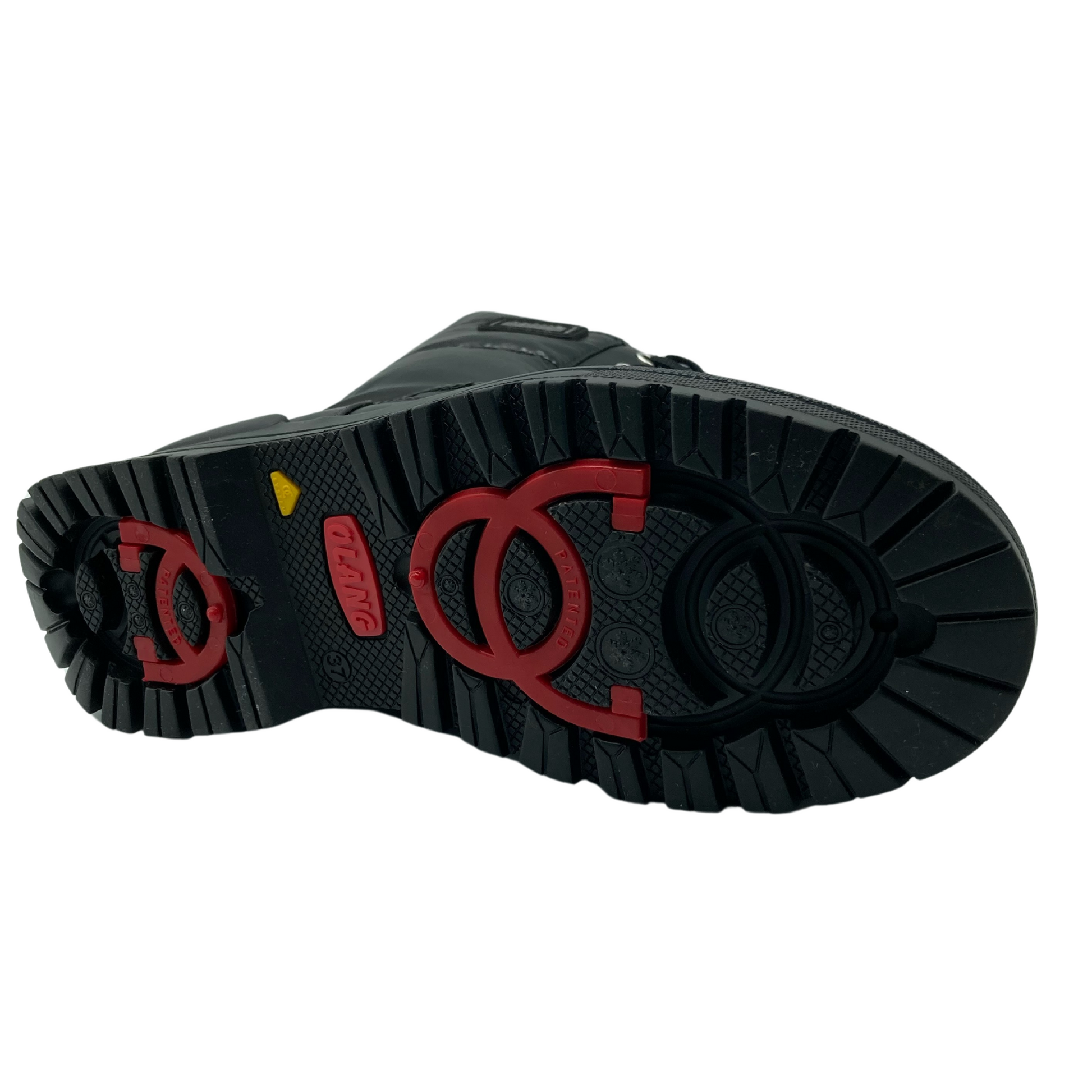Bottom view of cold weather boot with snow traction grip closed