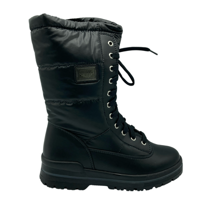 Right facing view of black cold weather boot with black rubber outsole and silver eyelets