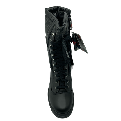 Top view of black cold weather boot with lace up closure