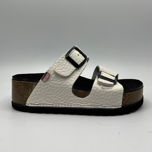 Right facing view of a platform sandal in a pebbled white leather.  Two thick straps across with adjustable buckles.