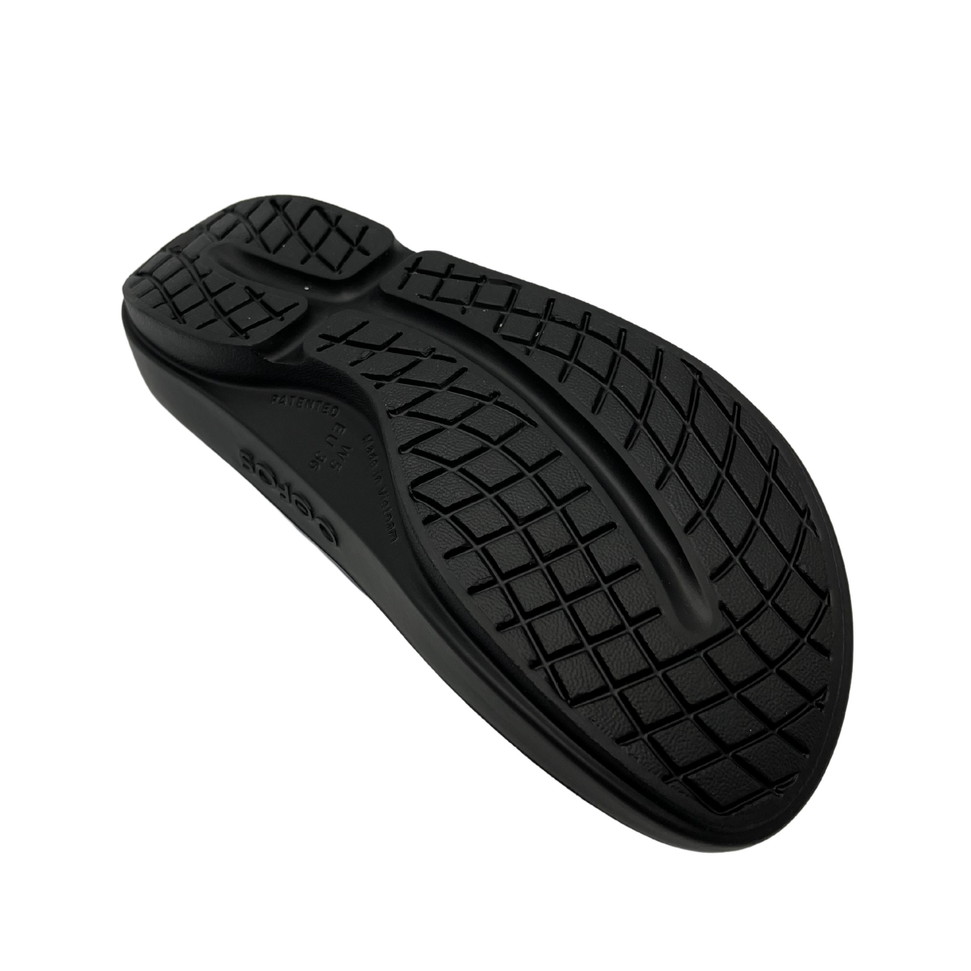 Bottom  view of foam, thong strapped sandals with iridescent finish on straps