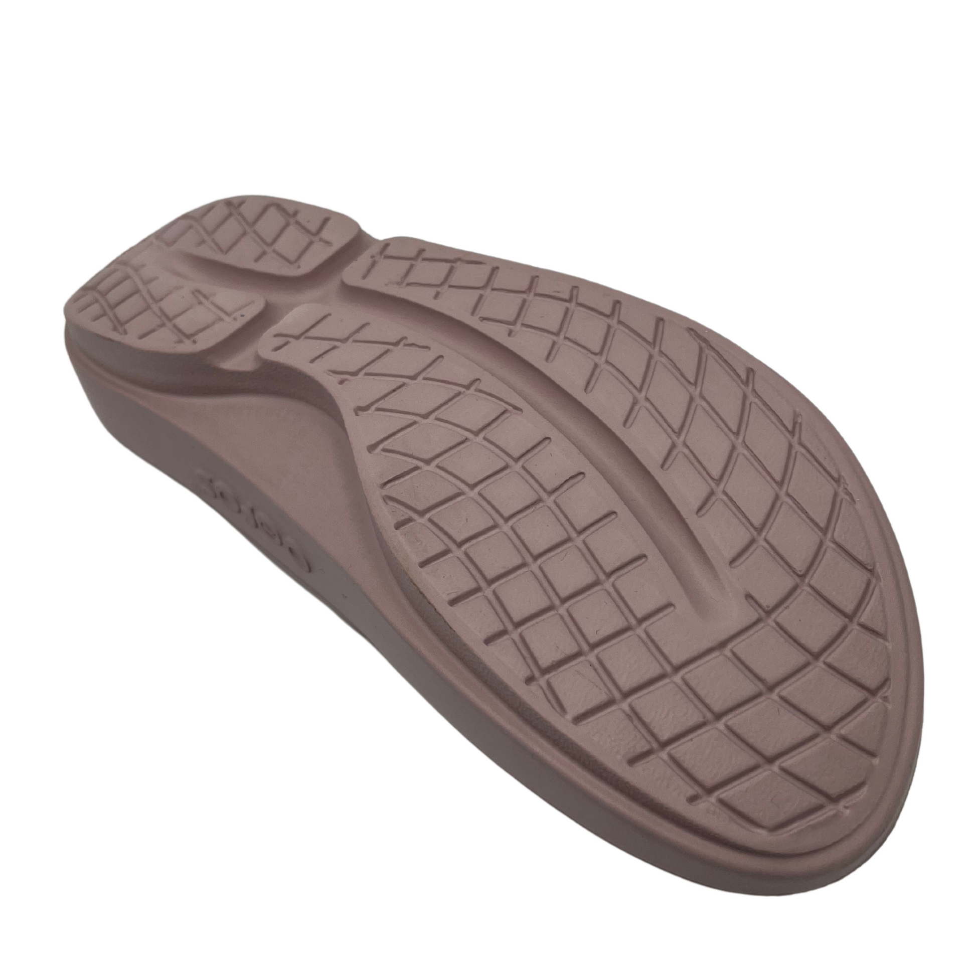 Bottom view of pink foam thong sandal