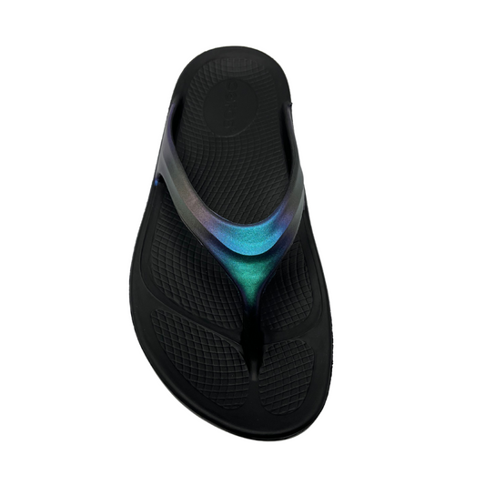 Top view of black thong sandal with iridescent purple upper