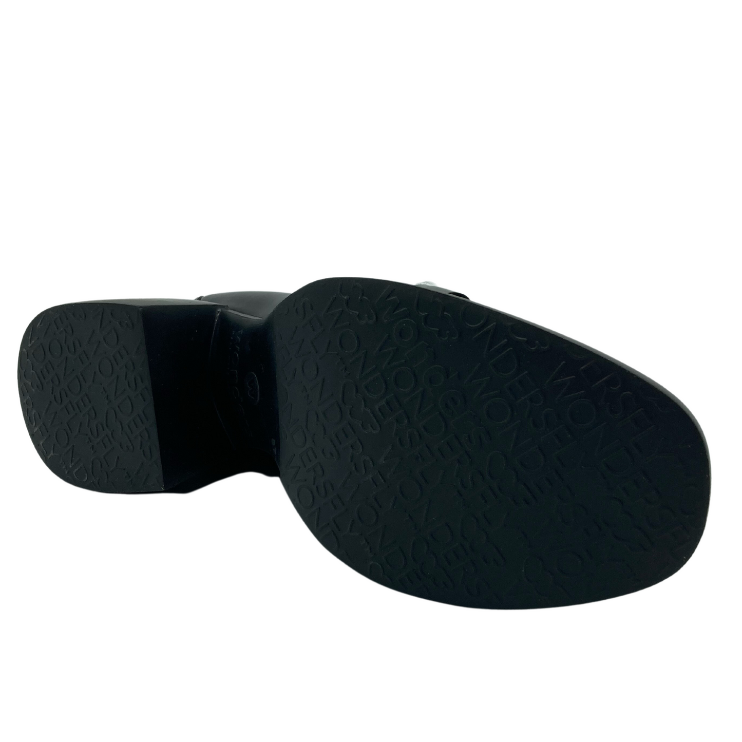 Bottom view of black rubber sole embossed with Wonders logo