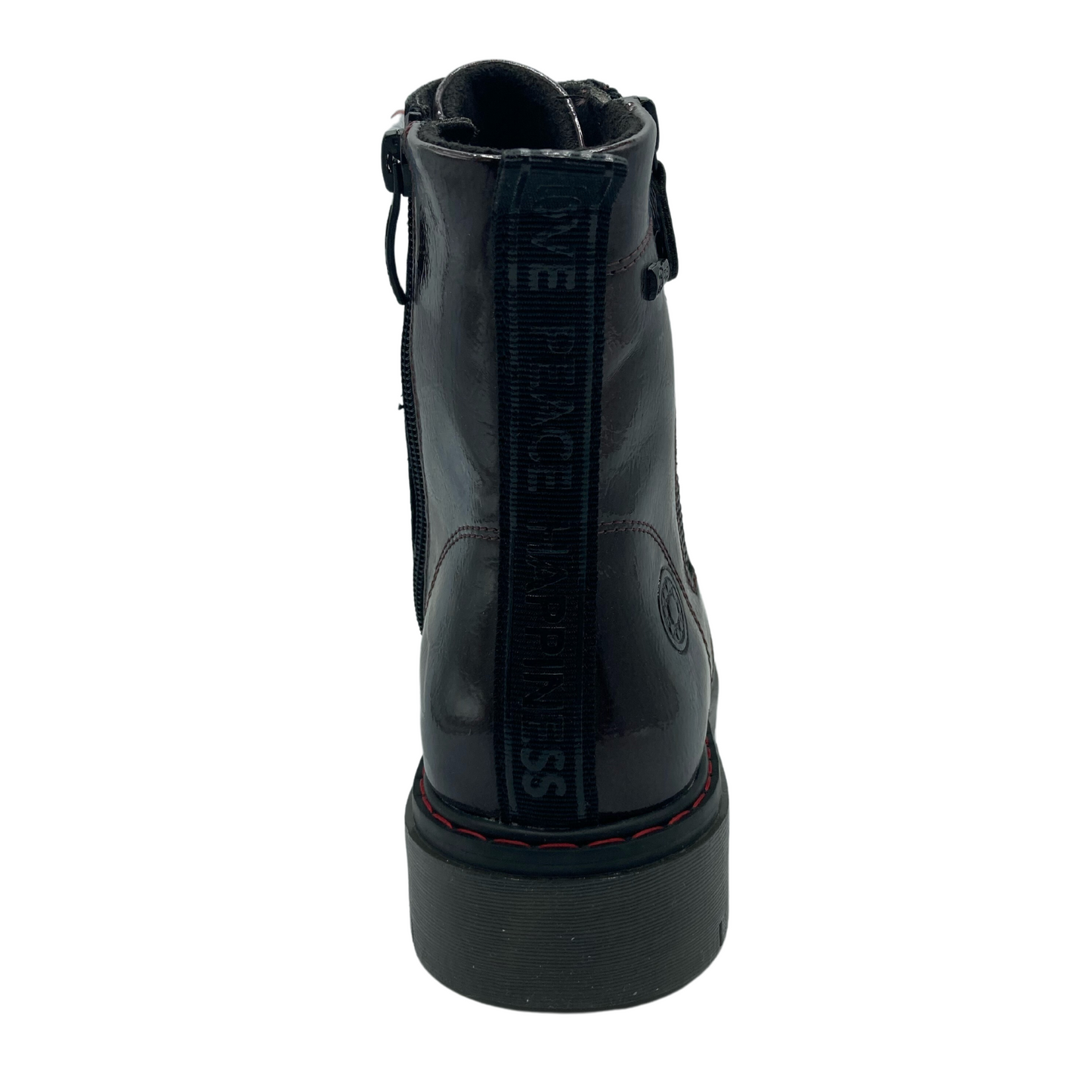 Heel view of back of vegan leather boot with rubber outsole and red stitching around top of sole