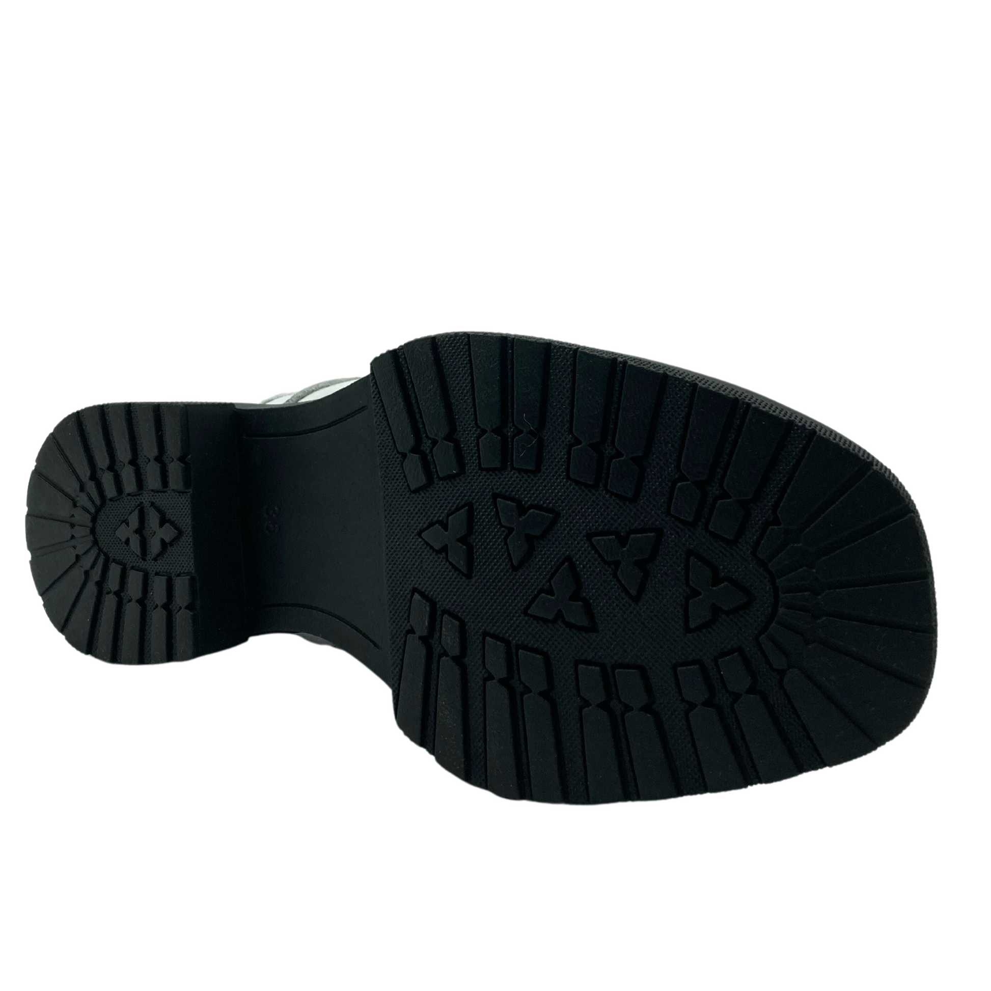 Bottom view of white leather short boot with black outsole and short block heel