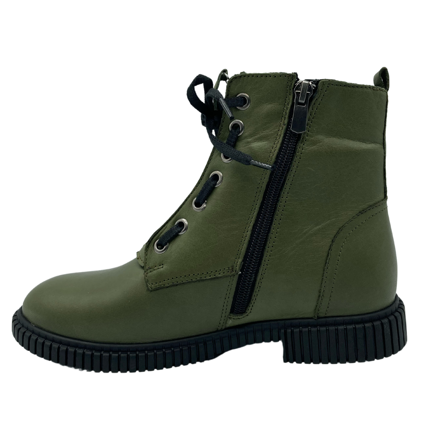 Left facing view of olive green leather boot with side zipper closure and black rubber outsole
