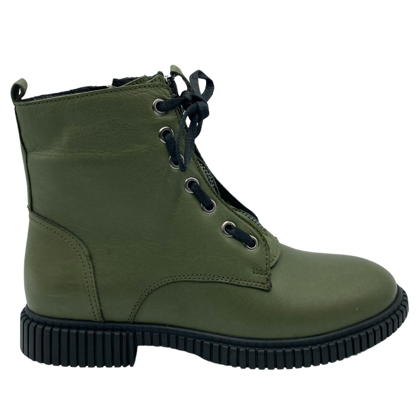 Right facing view of green leather boot with black rubber outsole and laces