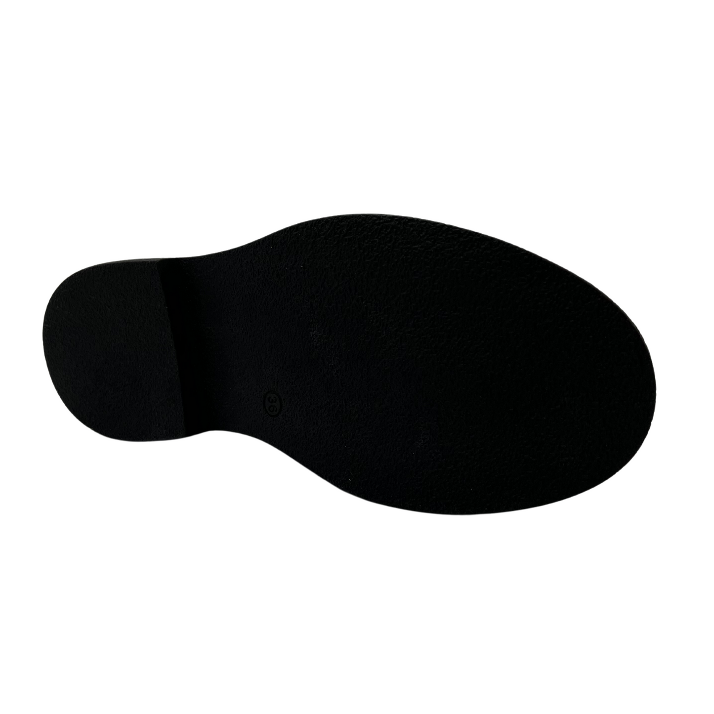 Bottom view of black patent leather loafer with knotted strap detail and black rubber outsole